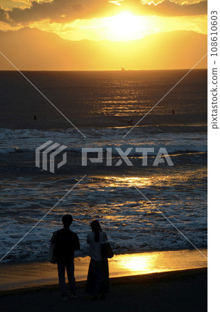 Two people on the beach Two people on the beach 108610603