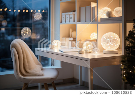 a desk with christmas lights on it and a chair in front of the window looking out to the city outside 108610828