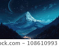 Snow-covered mountain with a high white peak on a starry night under the light of a huge moon. Colorful landscape with a view of a small village in the lowlands of the forest. 108610993