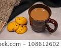 chocolate chip cookies and hot drinks 108612602