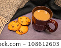 chocolate chip cookies and hot drinks 108612603