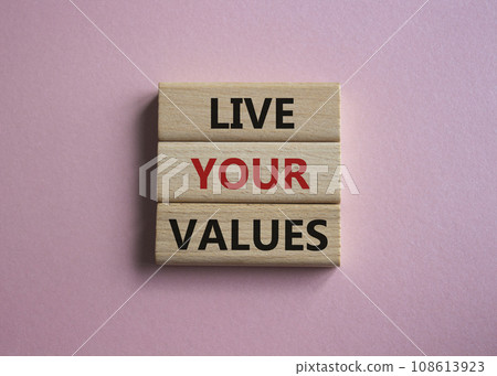 Live your values symbol. Concept words Live your values on wooden blocks. Beautiful pink background. Business and Live your values concept. Copy space. Live your values symbol. Concept words Live your values on wooden blocks. Beautiful pink background. Business and Live your values concept. Copy space. 108613923