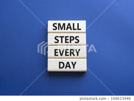 Small Steps Every Day symbol. Wooden blocks with words Small Steps Every Day. Beautiful deep blue background. Business and Small Steps Every Day concept. Copy space. 108613946