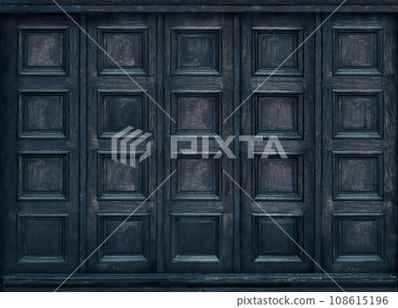 Classic wall with vintage dark blue wood panels 108615196