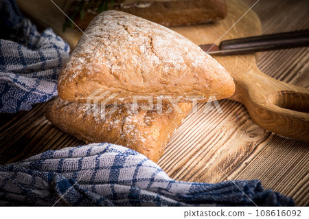 Triangular sandwich with cheese, ham and tomato. Triangular sandwich with cheese, ham and tomato. 108616092