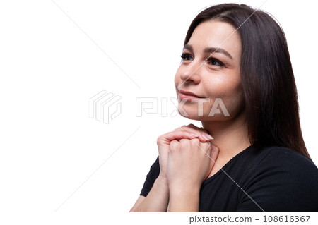 Young dreamy european woman dressed in basic t-shirt closeup Young dreamy european woman dressed in basic t-shirt closeup 108616367