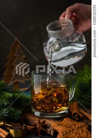 Cozy winter evening with tea Cozy winter evening with tea 108616395
