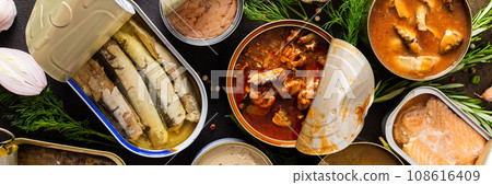 Open tin cans with canned fish Open tin cans with canned fish 108616409
