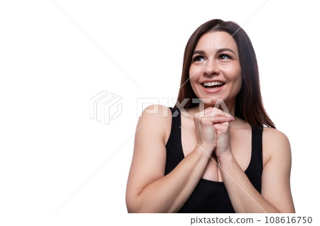 25 year old woman with black hair is surprised and opens her mouth 25 year old woman with black hair is surprised and opens her mouth 108616750