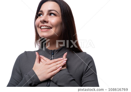 Happy young stylish woman with black hair smiling on white background 108616769