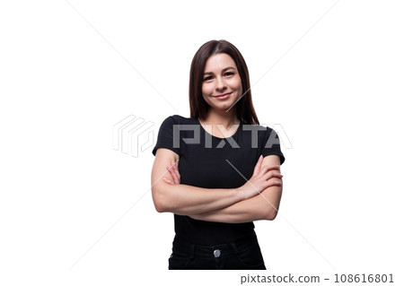 Young pretty European woman dressed in a black T-shirt folded her hands in front of her 108616801