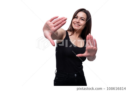 Casual young brunette woman actively gesturing 108616814