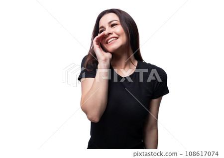 Young charming lady with brown eyes on a background with copy space 108617074