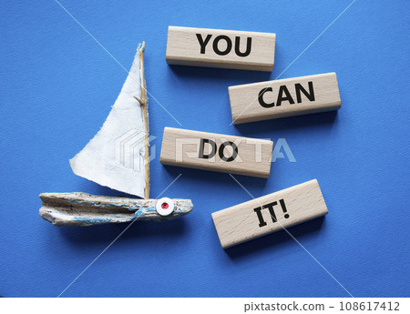 You can do it symbol. Concept words You can do it on wooden blocks. Beautiful blue background with boat. Business and You can do it concept. Copy space. 108617412