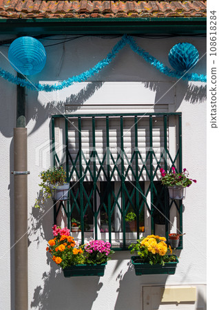 window in Porto city with San Juan festival decorations 108618284