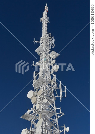 Transmitter tower frozen in winter frost Transmitter tower frozen in winter frost 108618496