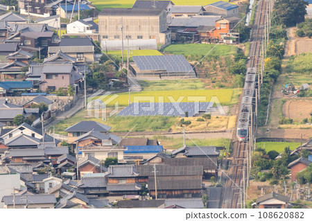 [Yosan Line] Limited express train passing through Kanonji city area 108620882