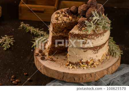 Slice of delicious naked coffee and hazelnuts cake Slice of delicious naked coffee and hazelnuts cake 108625570