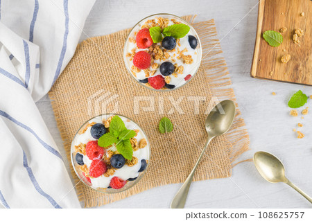 Granona with red fruits homemade yogurt 108625757