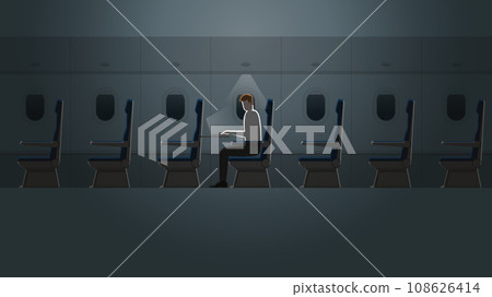 Employee salaryman working with laptop notebook in a plane cabin alone in the dark Employee salaryman working with laptop notebook in a plane cabin alone in the dark 108626414