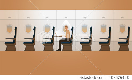 Employee salaryman working with laptop notebook in a plane cabin alone in the dark 108626428