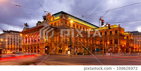Vienna cityscape with central avenue and State Opera with evening illumination Vienna cityscape with central avenue and State Opera with evening illumination 108626972