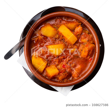 Lunch is served in deep plate - Rioja potatoes, with chorizo sausages and thick sauce Lunch is served in deep plate - Rioja potatoes, with chorizo sausages and thick sauce 108627386