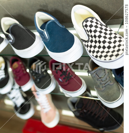Casual men shoes on shelves in store 108627578
