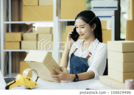 Small business owners, startup and e-commerce concept. Small business owners, startup and e-commerce concept. 108629496