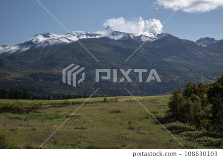 Tokachidake mountain range with its first snow cap Tokachidake mountain range with its first snow cap 108630103