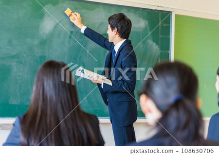 Male teacher and students teaching in the classroom Male teacher and students teaching in the classroom 108630706