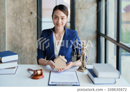 Law, Consultation, Agreement, Contract, Concept Attorney or Lawyer is sitting and accepting complaints from clients for home and land matters in court 108630872