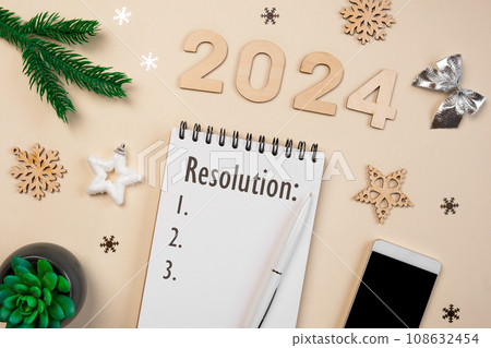New Year Aims 2024. To Do List. Empty Notebook at the Desk with Holiday Decoration. Top view. Creating Plan, Resolution. New Life, Start Up, Beginning Concept. Business ideas. Goals, action, checklist New Year Aims 2024. To Do List. Empty Notebook at the Desk with Holiday Decoration. Top view. Creating Plan, Resolution. New Life, Start Up, Beginning Concept. Business ideas. Goals, action, checklist 108632454