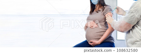 Pregnant Vaccination. Pregnant Woman In Face Mask Getting Vaccinated in Clinic. Doctor Giving Corona Virus Vaccine Injection Patient. Covid-19 Flu Protection. Banner 3:1 Pregnant Vaccination. Pregnant Woman In Face Mask Getting Vaccinated in Clinic. Doctor Giving Corona Virus Vaccine Injection Patient. Covid-19 Flu Protection. Banner 3:1 108632580