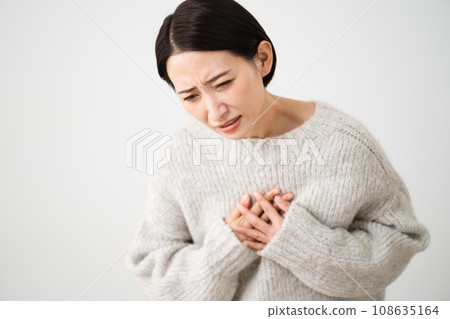 Young woman wearing knitwear lifestyle image Young woman wearing knitwear lifestyle image 108635164