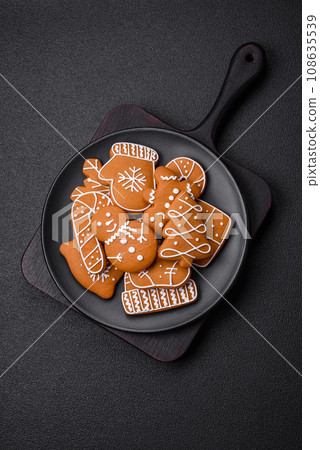 Delicious gingerbread cookies with honey, ginger and cinnamon Delicious gingerbread cookies with honey, ginger and cinnamon 108635539