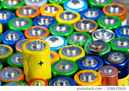 Old used batteries. Batteries background Old used batteries. Batteries background 108635608