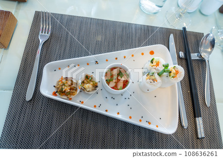 Vietnamese spring rolls served as a lunch course on a cruise ship in Halong Bay, Vietnam 108636261