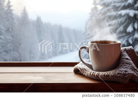 Mug of hot cocoa on a rustic wooden table with a view of snowy outdoors. Generative AI 108637480