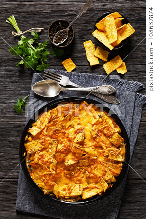 Frito chicken casserole in baking dish, top view Frito chicken casserole in baking dish, top view 108637874