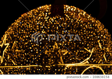 Golden holiday glowing backdrop. Defocused bokeh background Golden holiday glowing backdrop. Defocused bokeh background 108638158