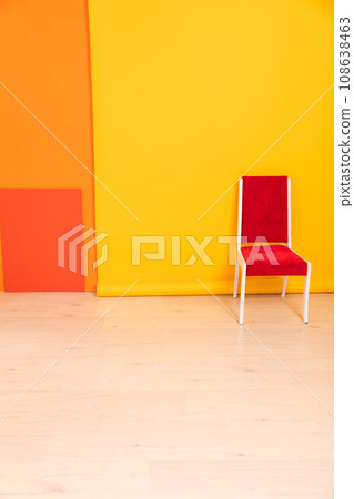 Red chair in yellow orange room interior 108638463