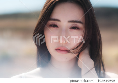 Beauty image of a woman in nature 108639696