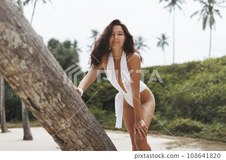 Luxury Vacation of Happy Beach Fashion Woman in Stylish White Modern Swimwear 108641820