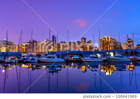 Beautiful view of Vancouver skyline with harbor at sunset, British Columbia, Canada 108641989