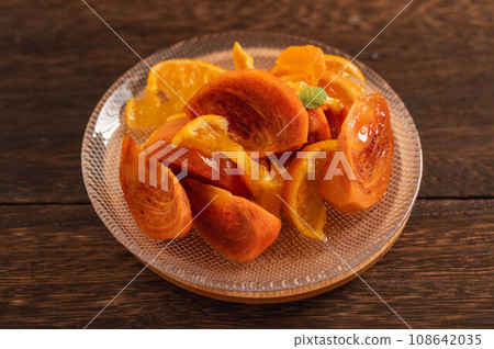 Persimmon and mandarin orange dessert Persimmon and mandarin orange dessert 108642035