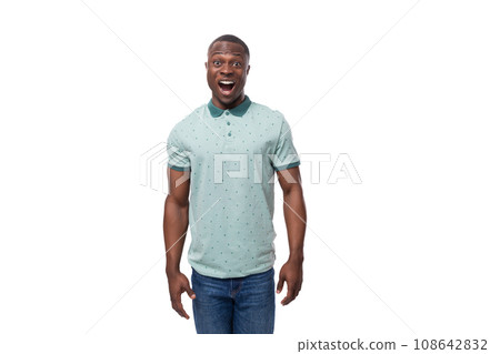 young slender American man dressed in a T-shirt is surprised and opened his mouth young slender American man dressed in a T-shirt is surprised and opened his mouth 108642832