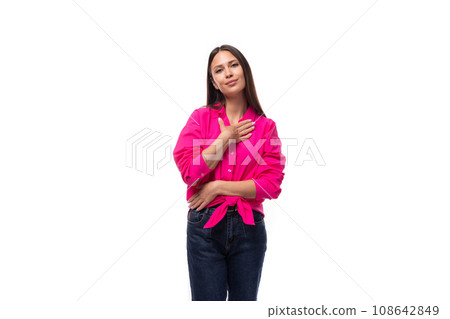 young employee of an office company woman dressed in a pink shirt on a white background with copy young employee of an office company woman dressed in a pink shirt on a white background with copy 108642849