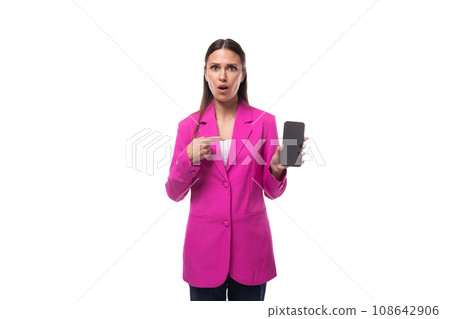 young slim brunette secretary woman wearing lilac jacket holding smartphone with mockup 108642906