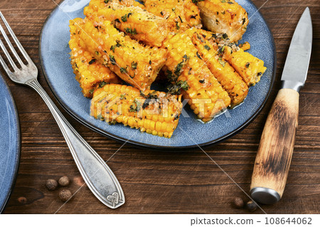 Corn cobs grilled or baked. Corn cobs grilled or baked. 108644062